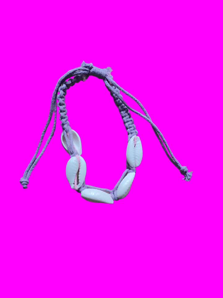 SKELETON COWRIE SHELL/PURPLE WAXCORD BRACELET